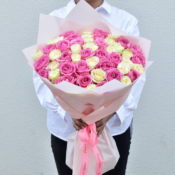 51 pink and white mixed roses bouquet with pink wrap - valentine special
