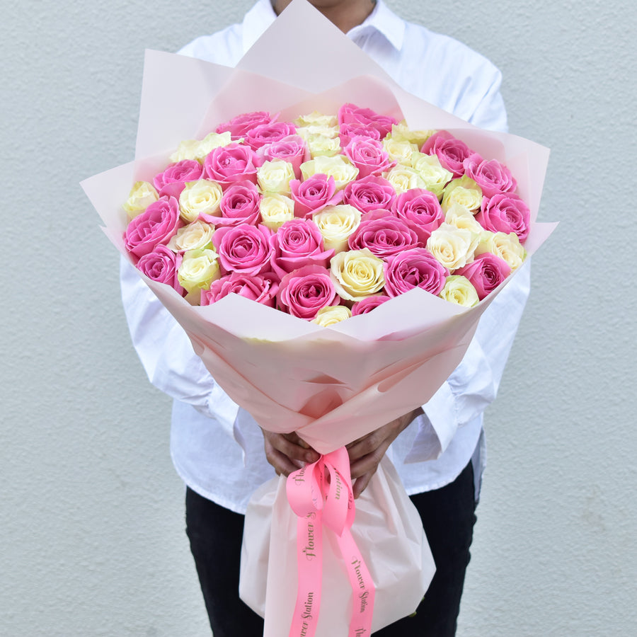 51 pink and white mixed roses bouquet with pink wrap - valentine special