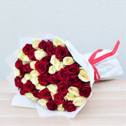 red and white rose bouquet - flower station dubai