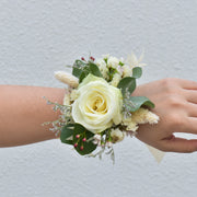 corsage of white roses