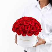 forever red roses in a hatbox
