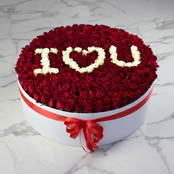 premium red roses grand flower box with i love you text in white roses - valentine special