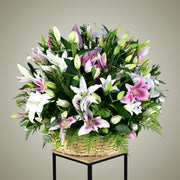 grand lily basket arrangement