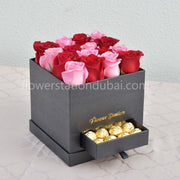 pink and red roses flower box with fererro rocher chocolate flower delivery in Dubai UAE