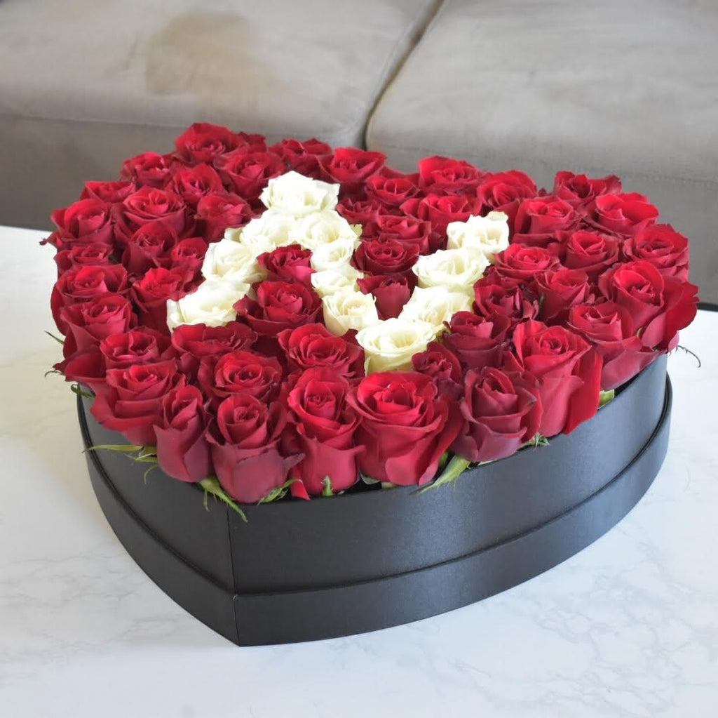 red roses with letter in heart box