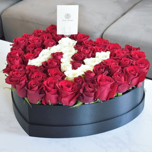 red roses with letter in heart box